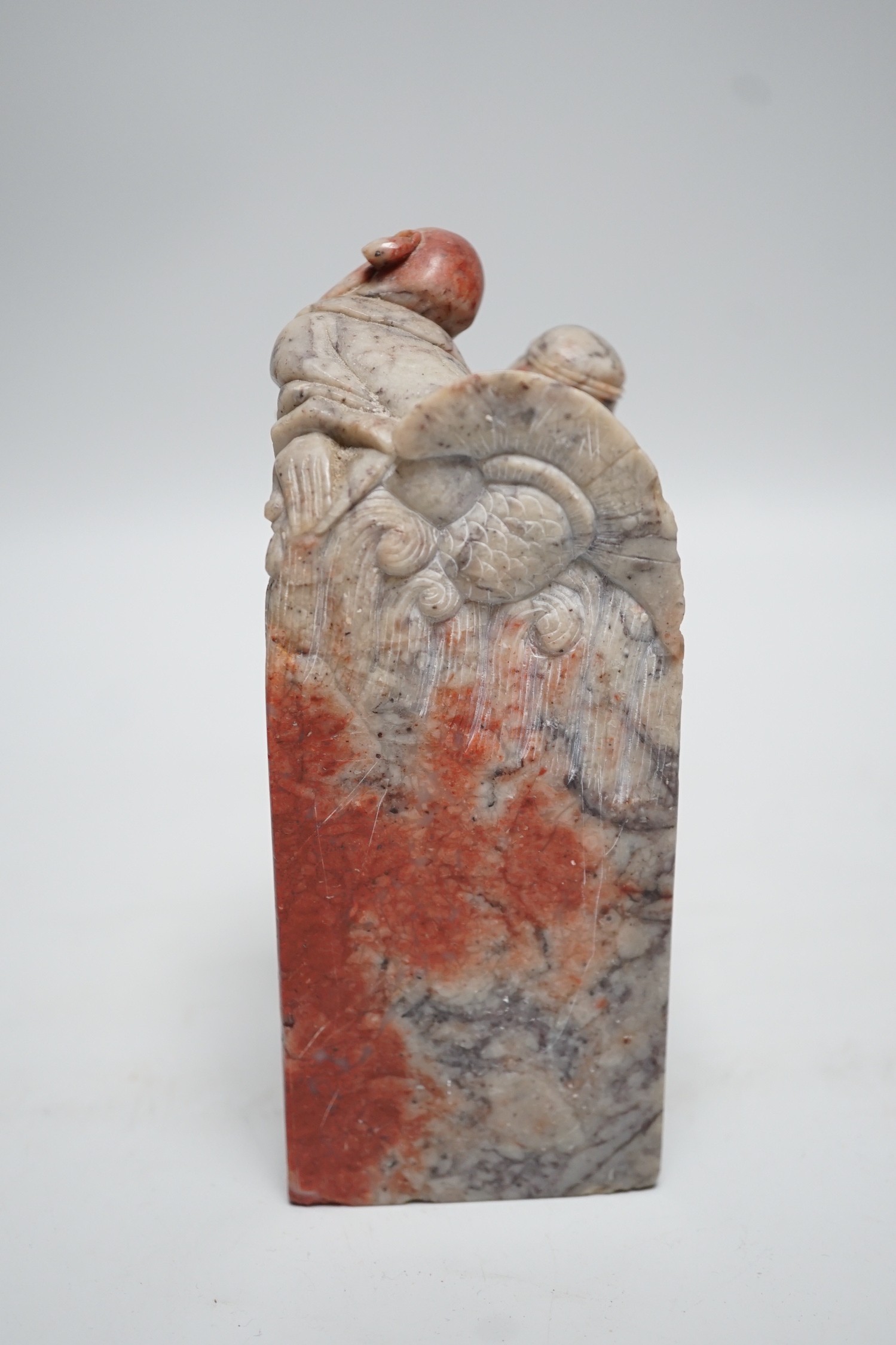 A large Chinese ‘chicken blood’ soapstone seal, Qing dynasty. 15cm